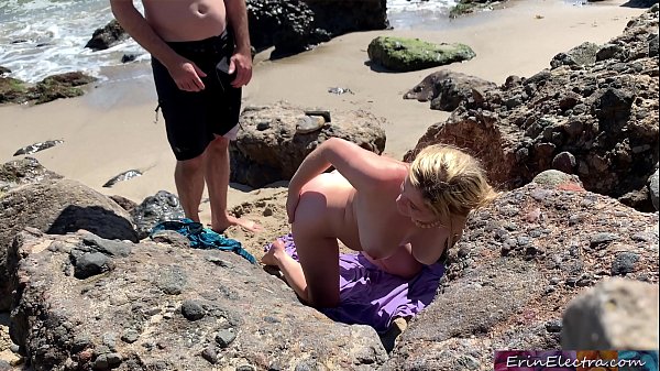 Voluptuous blonde sunbathing nude on the beach fucks passer-by – Erin Electra