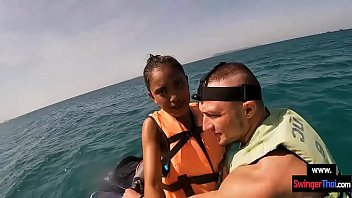 Public trunk sucking Asian during a journey with a jetski