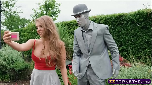 Huge-chested chick fucks a living statue performer outdoors