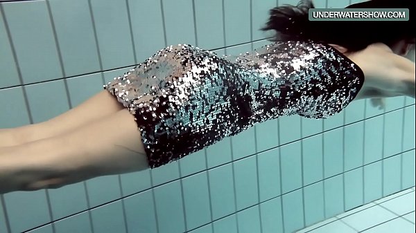 Loris blackhaired teenager swirling in the pool