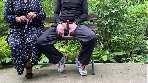 MILF stepmother milked her stepson outdoors in a rubber