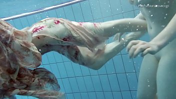 Two hot hairy beauties underwater