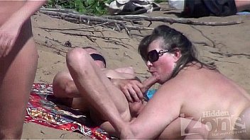 spycam oral pleasure on a naturist beach