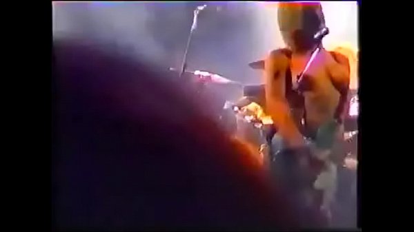 Courtney Love bare-chested onstage