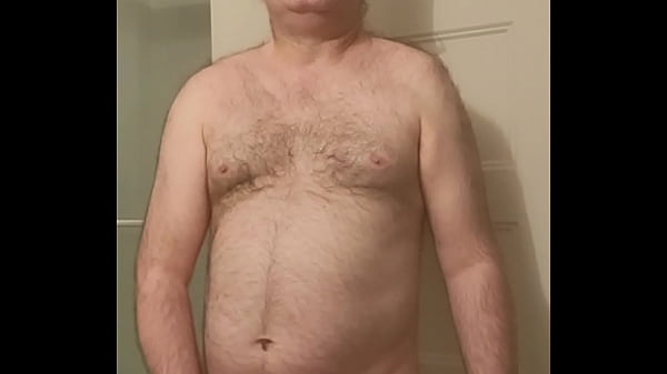 Nude Martin Lavallée masturbates, blows a load and licks his own sperm with a faux-cock