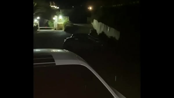 On the street in front of everyone