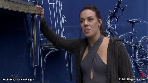 Black-haired spanked and fucked in public