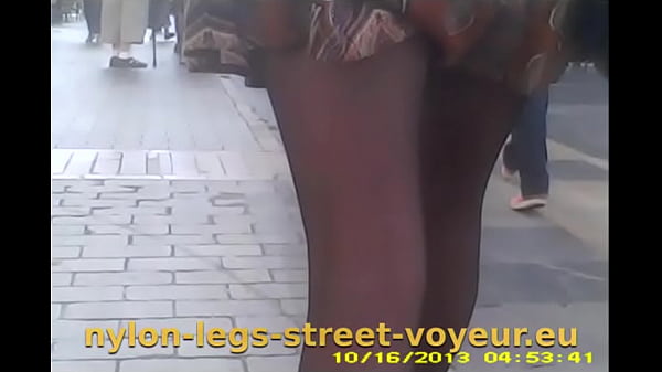 Nylon and stretch pants together on a street